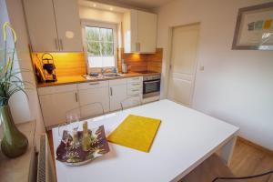 Greetsieler Inselhuus - Südwind