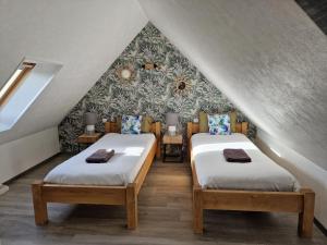 B&B / Chambres d'hotes L'Aurore de la Baie, vue sur le Mont-Saint-Michel : photos des chambres