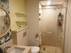 Mangroovy - 1BR GF +2 wall beds Garden & Pool view