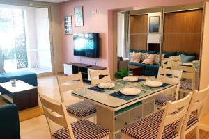 Mangroovy - 1BR GF +2 wall beds Garden & Pool view