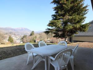 Maisons de vacances Maison recente 70m² | 8 pers | 3 chambres | Terrasse | Parking | La Bourboule - FR-1-608-203 : photos des chambres