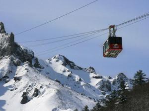 Appartements Hyper Centre Mont-Dore: T3 spacieux avec balcon et WiFi, a cote des Thermes - FR-1-608-23 : photos des chambres