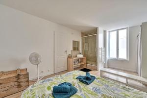 Appartements L'ESCALE -Climatisation- Proche CENTRALE TRICASTIN - WIFI - NETFLIX - Parking GRATUIT : photos des chambres