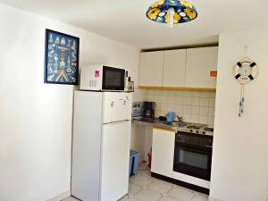 Charmante maison mitoyenne avec terrasse, 2 chambres pour 5 pers, en plein centre de Marseillan plage - FR-1-387-130