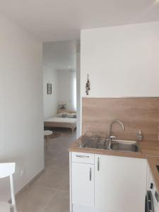 Appartements Studio neuf atypique centre ville Palavas vue mer : photos des chambres