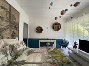 Maisons de vacances La Maison Blanche de Lanton : photos des chambres