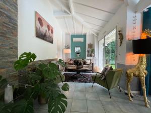 Maisons de vacances La Maison Blanche de Lanton : photos des chambres