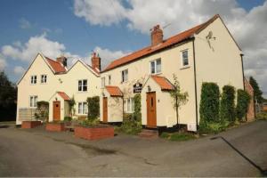 Two Bed First Floor Apartment in Village location