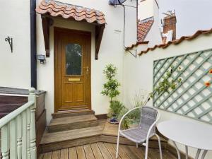 Two Bed First Floor Apartment in Village location