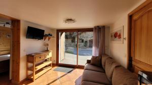 Appartements Chalet Coquelicot - confort montagnard et ambiance chaleureuse au coeur de Saint Martin de Belleville : photos des chambres