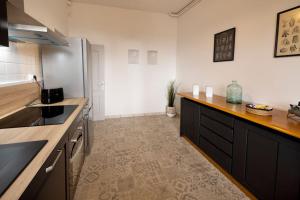 Appartements Le Familial - Tout equipe - Proche centre : photos des chambres