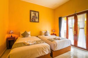 Phòng Hai Giường Đơn Loại Sang (Deluxe Twin Room)