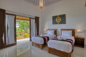 Phòng Deluxe 2 Giường Đơn Nhìn Ra Biển (Deluxe Twin Room with Sea View)