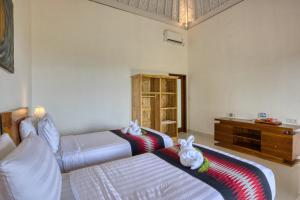 Phòng Deluxe 2 Giường Đơn Nhìn Ra Biển (Deluxe Twin Room with Sea View)