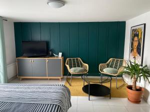 Appartements Dependance lumineuse et calme avec acces jardin : photos des chambres