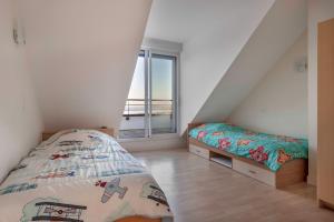 Maisons de vacances Maison lumineuse, pour 8, avec vue sur mer : photos des chambres