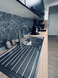 Appartements NARCISSE Balneo, Sauna, Hammam : photos des chambres
