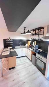 Appartements Logement moderne au coeur du village : photos des chambres