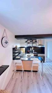 Appartements Logement moderne au coeur du village : photos des chambres