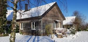 Maisons de vacances La Tuillere : maison en bois avec vue et piscine : photos des chambres