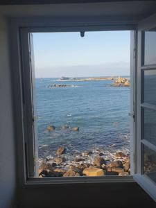 Maisons de vacances Magnifique maison les pieds dans l'eau : photos des chambres