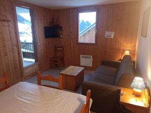 Appartements travelski home classic - Les Chalets de la Fontaine du Roi 3 : photos des chambres