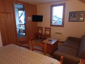 Appartements travelski home classic - Les Chalets de la Fontaine du Roi 3 : photos des chambres