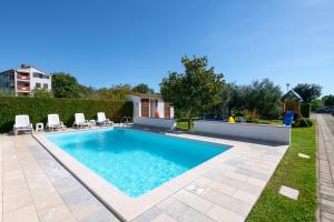 VILLA LIVIA with three nice apartments, swimming pool, childrens playground, barbecue and free parking