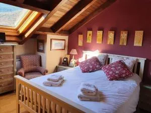 DUPLEX ABUHARDILLADO EN ESTERRI d'ÀNEU - Unarre