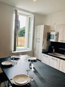 Le Riquet - jardin privé, clim, RDC