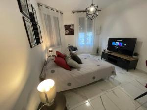 Appartements Le Dolce Vita - Centre historique, proche toutes commodites, stationnement aise, Wifi-Netflix : photos des chambres