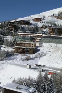 Appartements LOGEMENT 4 PERSONNES : photos des chambres