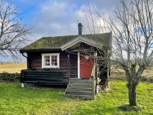 Backgårdens Timmerstuga