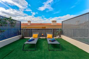 Luxury townhouse with pools, solarium, gas barbecue and sea views in Puerto de Santiago