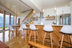 Awesome over the water overlooking West End - Aire Agua home