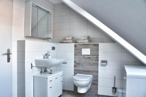 Nordsee Anker Unsere moderne 87 qm Ferienwohnung mit zwei Schlafzimmer in Norden Ortsteil Ostermarsch