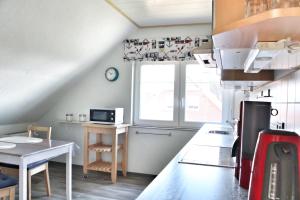 Nordsee Anker Unsere moderne 87 qm Ferienwohnung mit zwei Schlafzimmer in Norden Ortsteil Ostermarsch