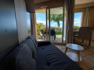 Appartements Studio les Pieds dans L'eau au bord du lac d'Annecy : photos des chambres