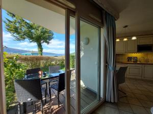 Appartements Studio les Pieds dans L'eau au bord du lac d'Annecy : photos des chambres