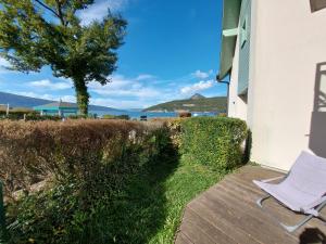 Appartements Studio les Pieds dans L'eau au bord du lac d'Annecy : photos des chambres