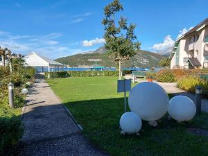 Appartements Studio les Pieds dans L'eau au bord du lac d'Annecy : photos des chambres