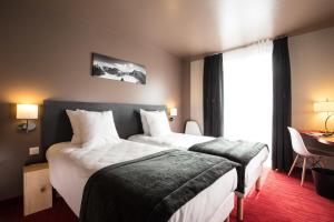 SOWELL HOTELS Le Parc & Spa : photos des chambres