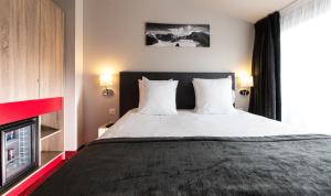 SOWELL HOTELS Le Parc & Spa : photos des chambres