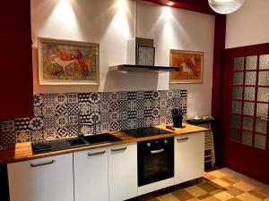Appartements Appartement Signature Art Deco : photos des chambres