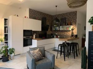 Appartements Logement spacieux tout confort : photos des chambres