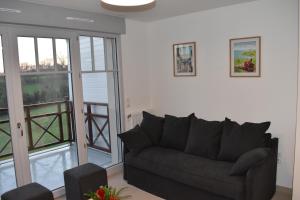 Appartements Le Saint Pierre en Baie Appt 3-4 pers parking prive : photos des chambres