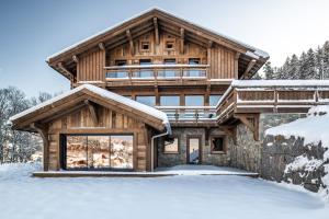 Le Grand V, chalet de luxe avec piscine intérieure