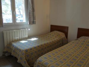 Appartements Sant Ambroggio : photos des chambres