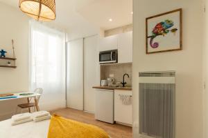 Appartements VilleneuveCityStay Jungle : photos des chambres