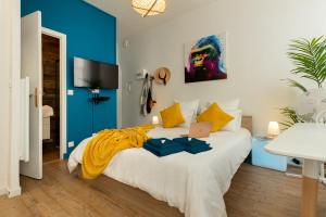 Appartements VilleneuveCityStay Jungle : photos des chambres